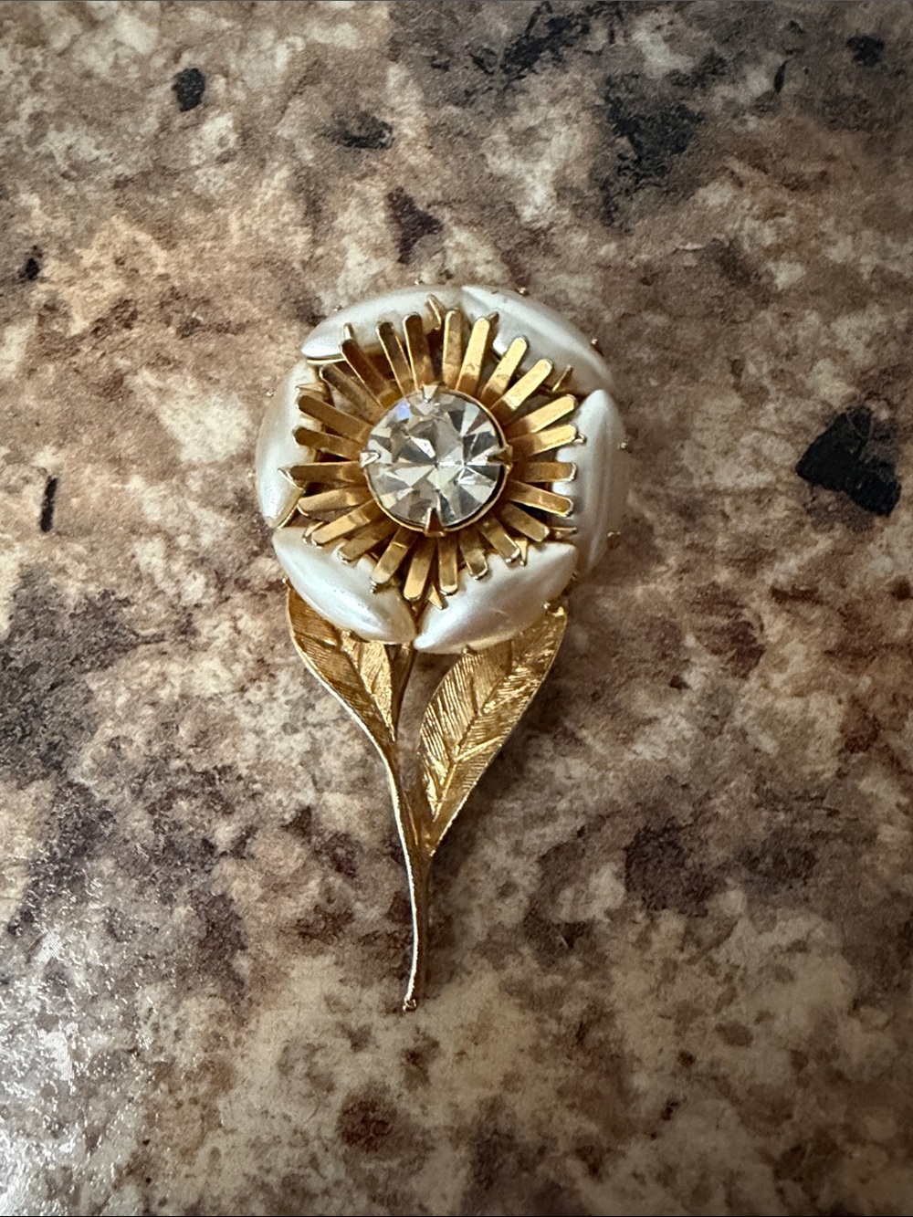 Gold-tone Floral Leaf Brooch with Crystal Center
